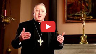 Archbishop Mitchell Rozanski