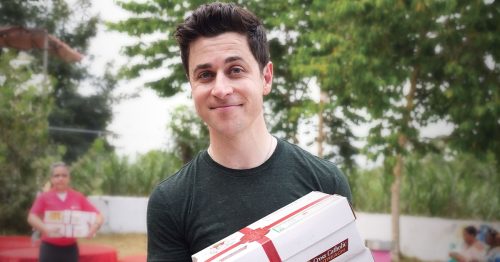 David Henrie holding a Box of Joy.