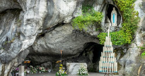 The statue of the Virgin Mary in the grotto in Lourdes, France.