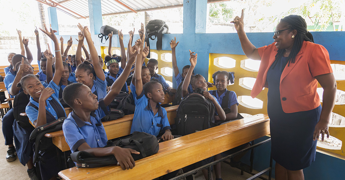 A teacher at the Kobonal Mission School in Kobonal, Haiti, leads a lively class discussion.